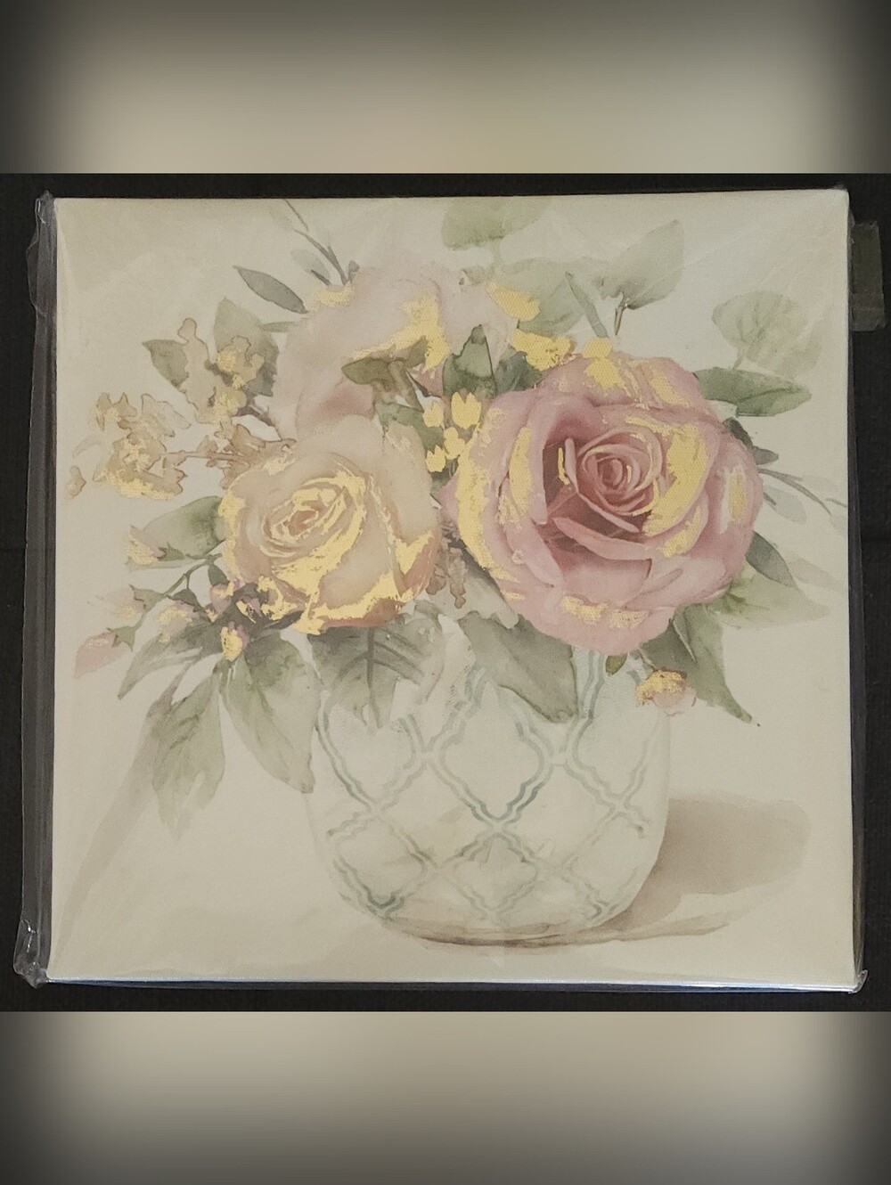 Floral canvas print of roses in a white vase.